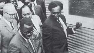 Dr. A. Milton Obote, His Excellency the President of the Republic of Uganda, laying the foundation stone of the Headquarters of the East African Development Bank, at a ceremony held on 10th November, 1969